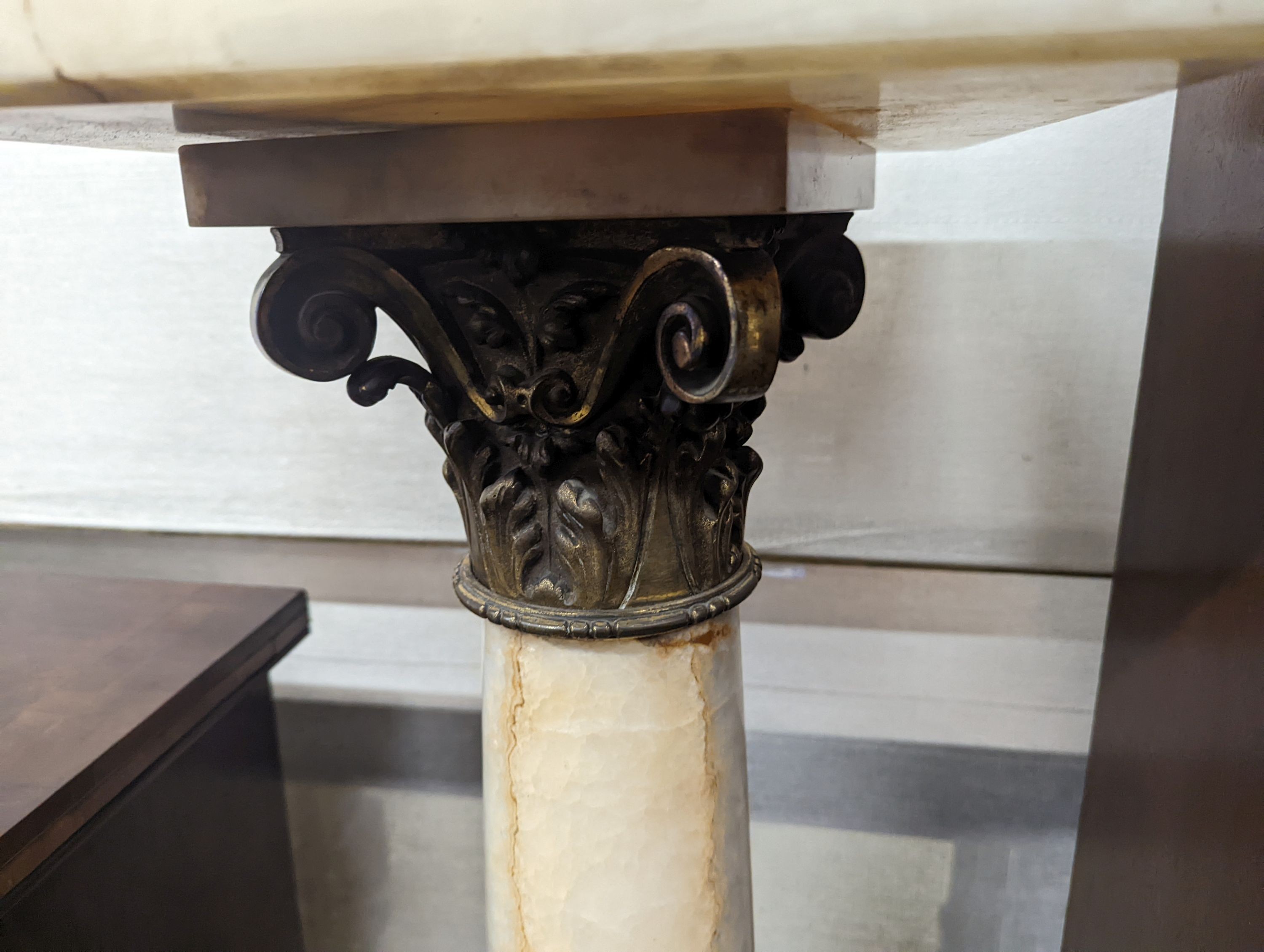 An early 20th century gilt metal mounted onyx pedestal, height 119cm